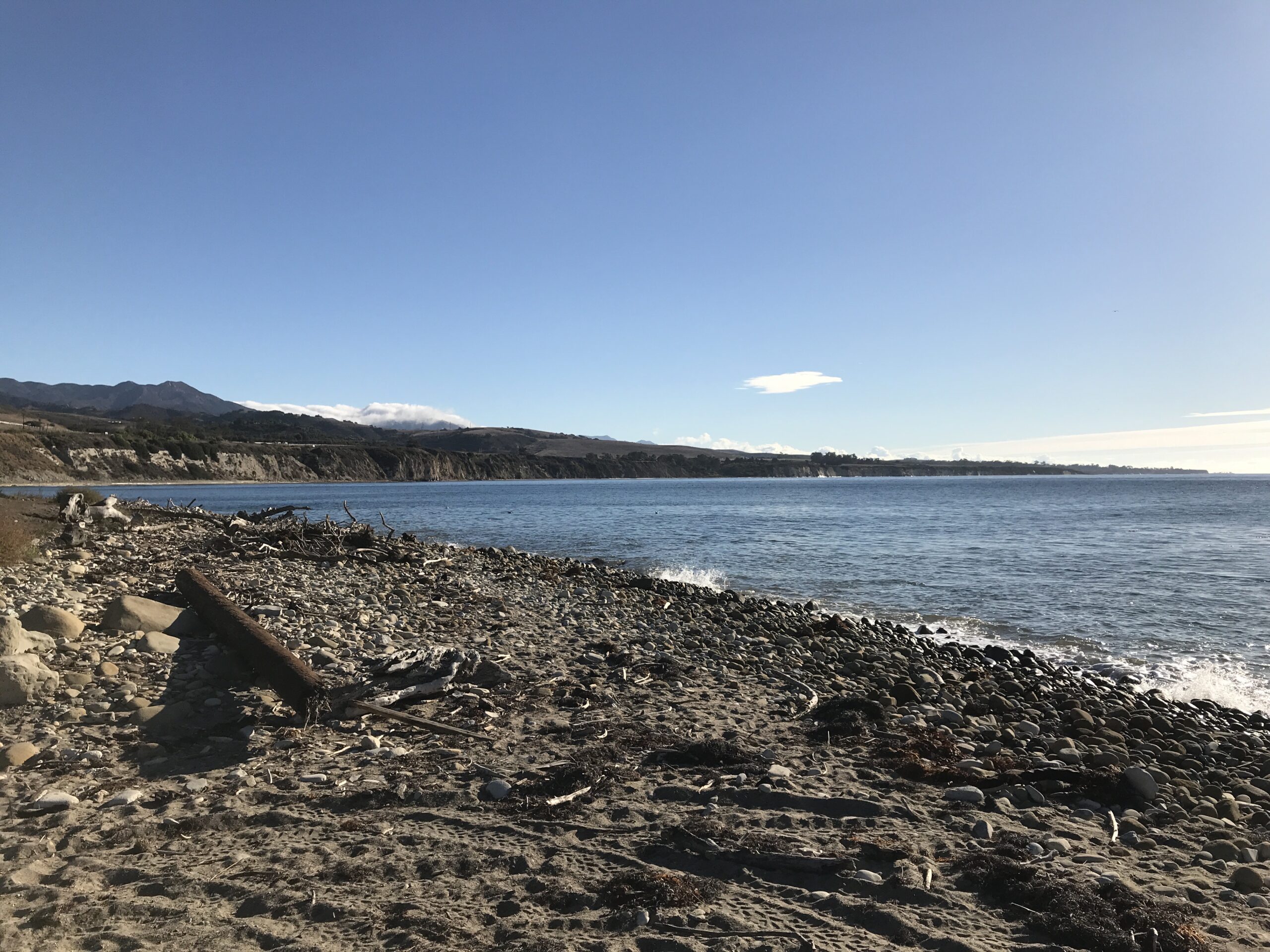 camping tents at El Capitan State Beach with ocean view and eucalyptus trees